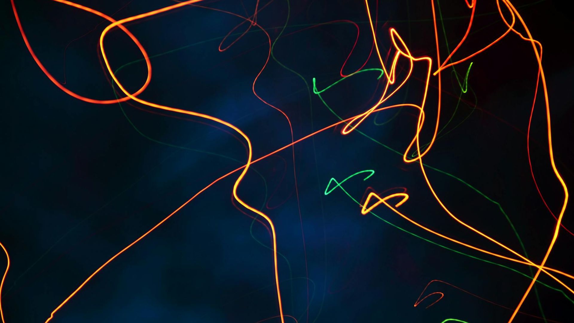 Abstract dark background with subtle light patterns symbolizing energy flow.